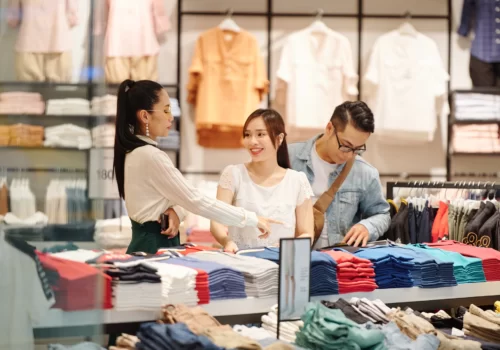 shop-assistant-helping-customers-2023-11-27-05-18-36-utc